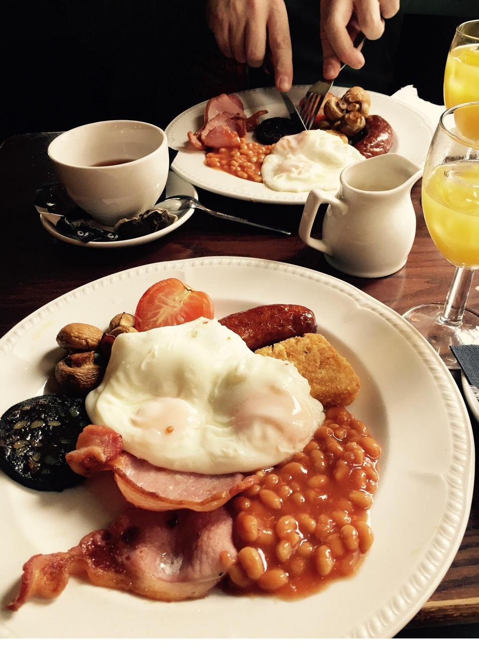 Full English breakfast with eggs, bacon, sausage and beans